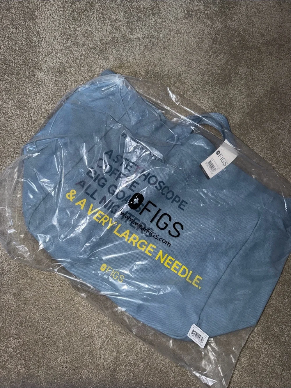 Figs Light Blue Duffel Bag with Yellow Logo Text